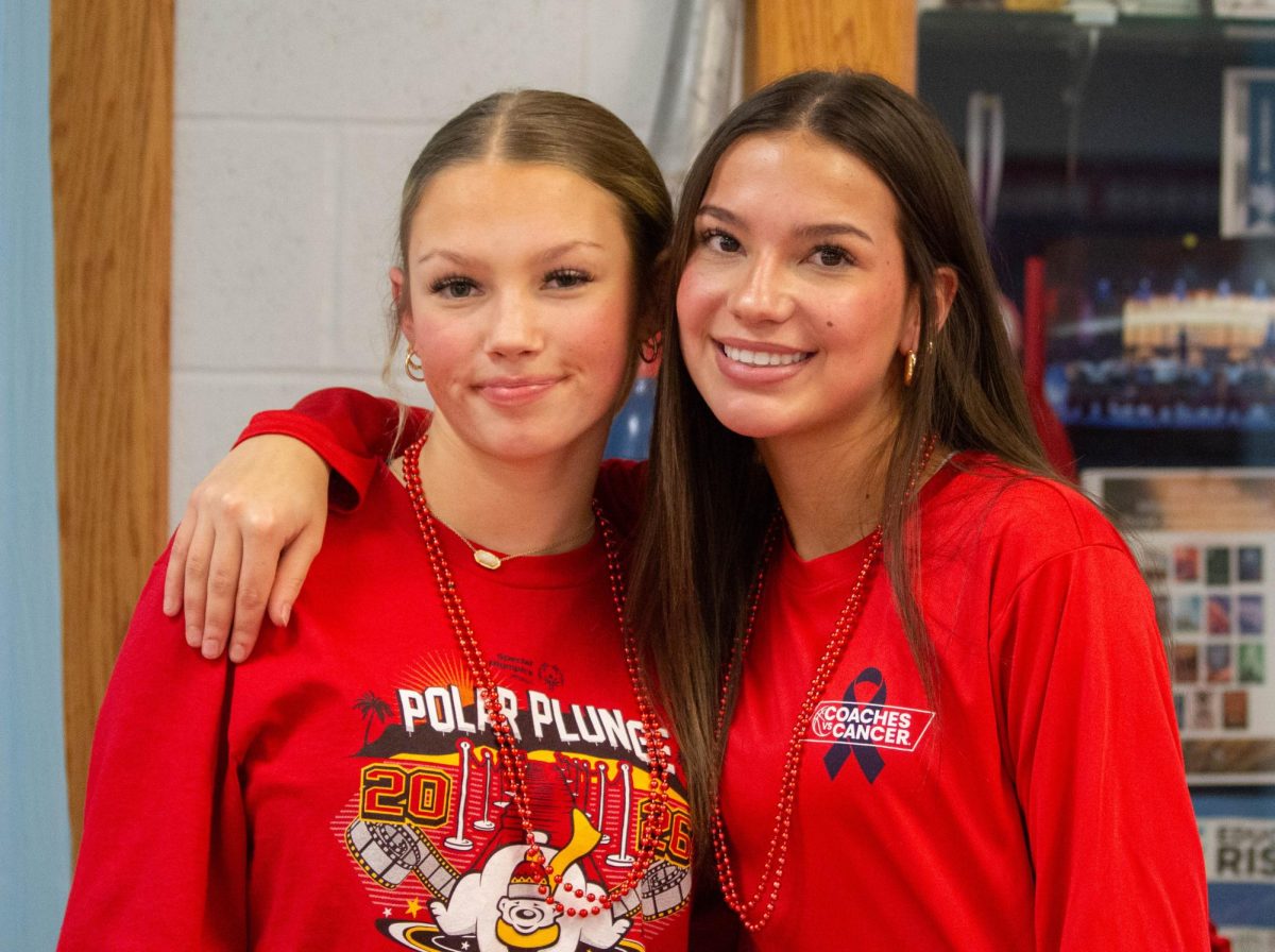Leah Zaat (11) and Olivia Washburn (11) represent STUCO by working the cakewalk