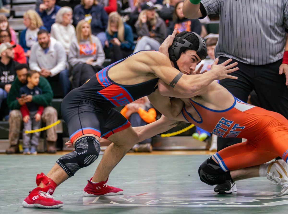 Alberto Malave (11) blocks a shot from a North Point opponent at districts.
