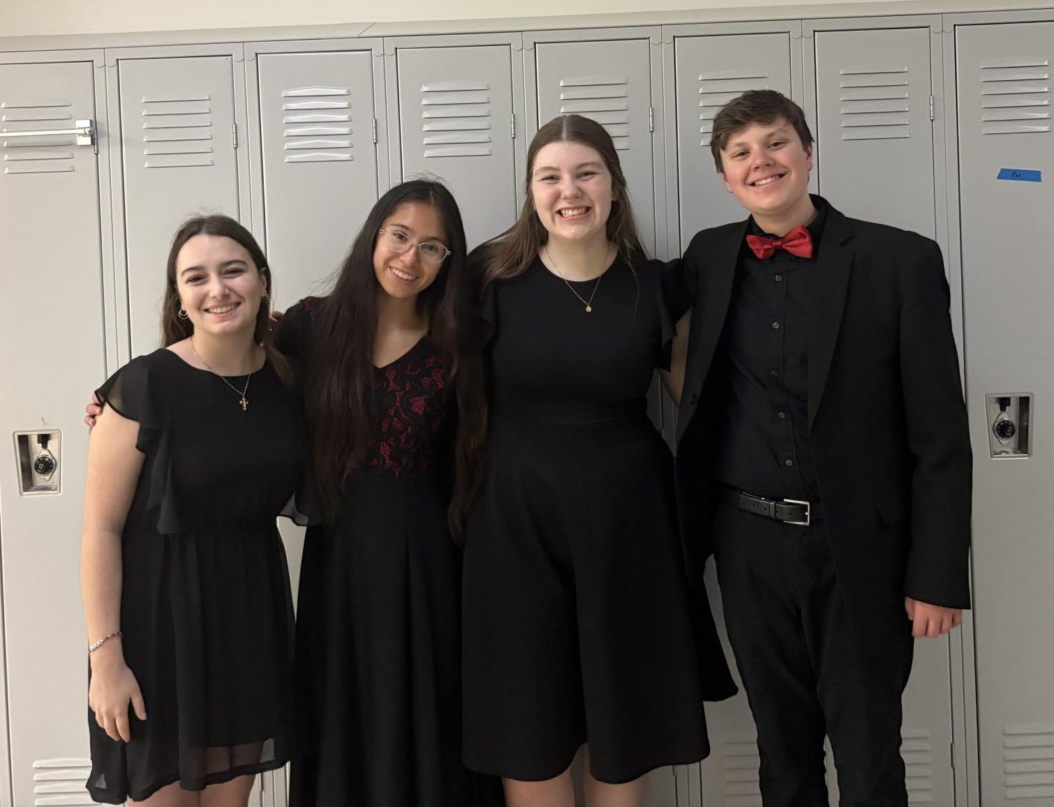 Whether individually or in small groups, student musicians elevated their craft to succinctly present their skills before a judge. (Students left to right: Sophie Shreve, Bella Navarro-Sanchez, Ellie Force, and Cohen Roach.)