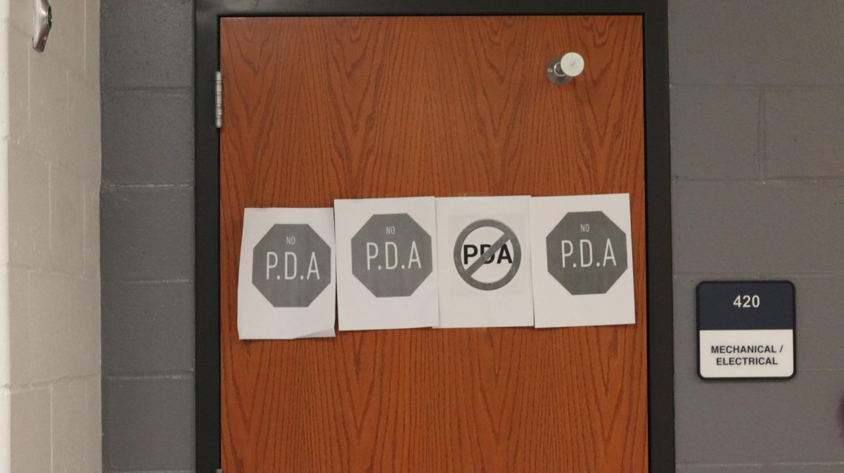 PDA signs posted in the 400 hallway