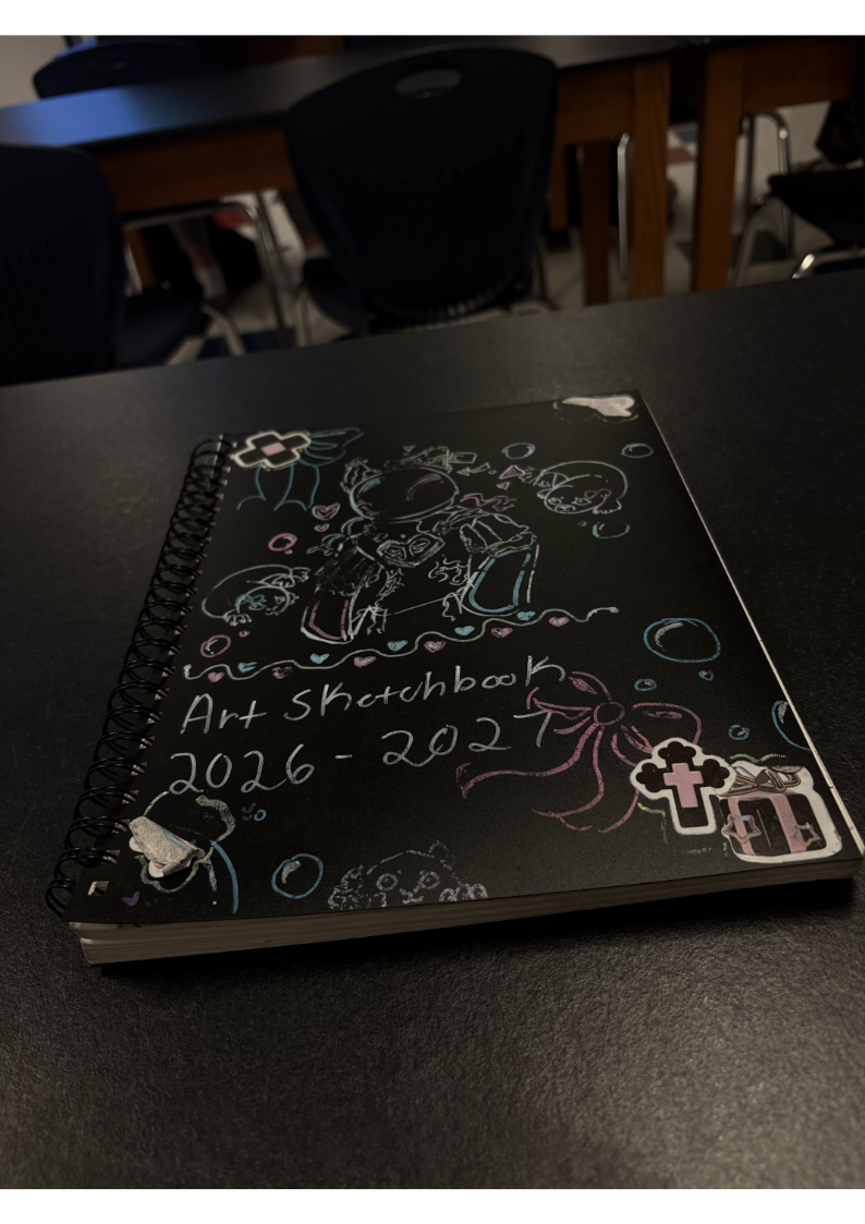 Maddison Kiem's (11) sketchbook that includes many of pieces of art throughout the year. 