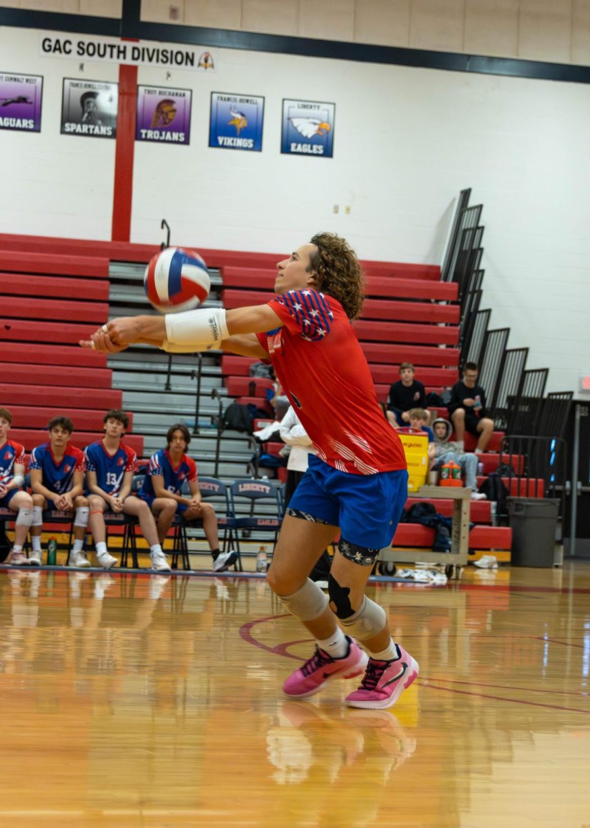 Owen Roberts (11) bumps the ball up to be set.

