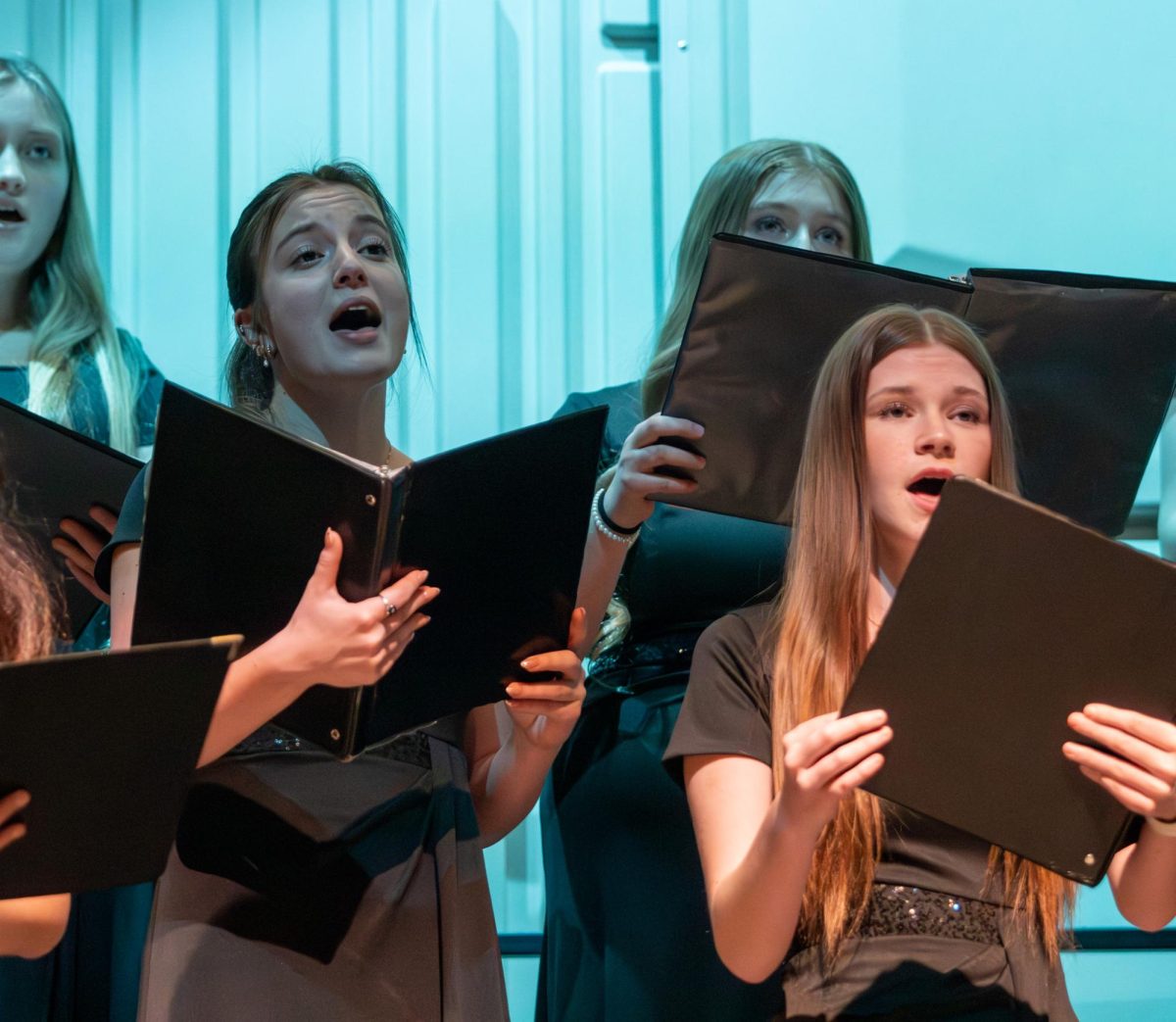 Lexi Mitchell (10) and Alana Grana (10) sing as members of Select Treble Choir.