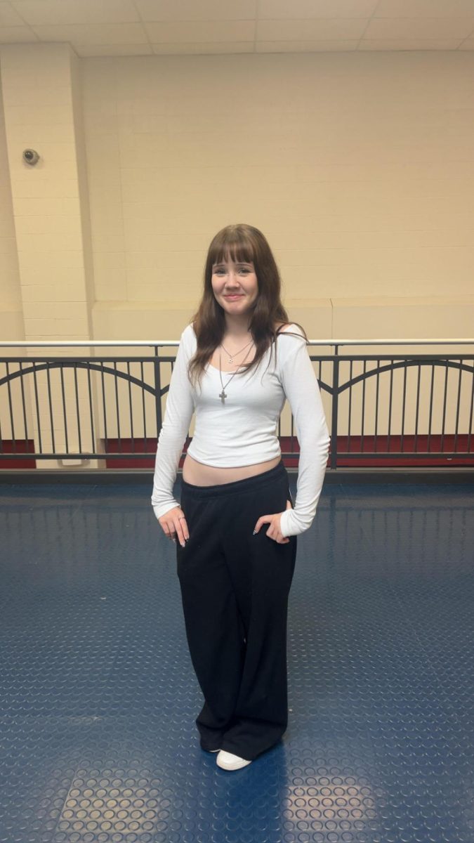 Natalia Ward (9) posing for a picture in an entertainment peice.