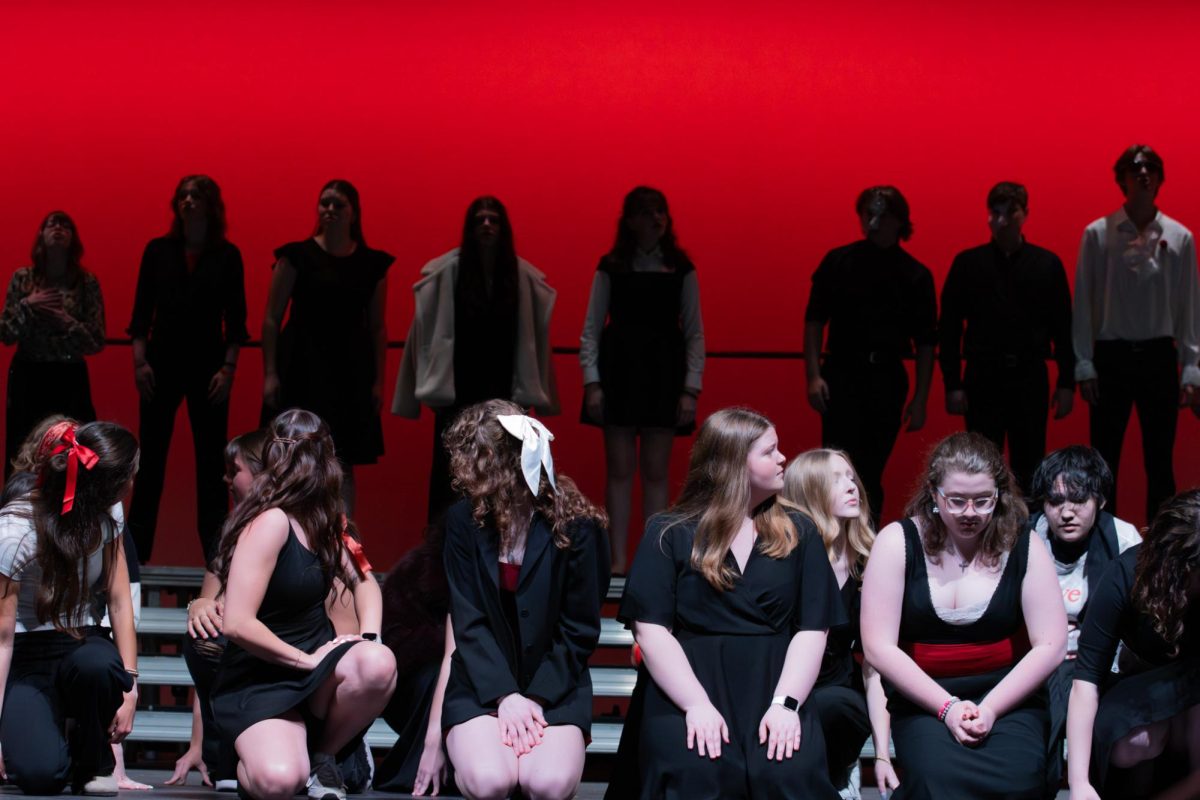 Mass choir sings The Phantom of the Opera medley. 