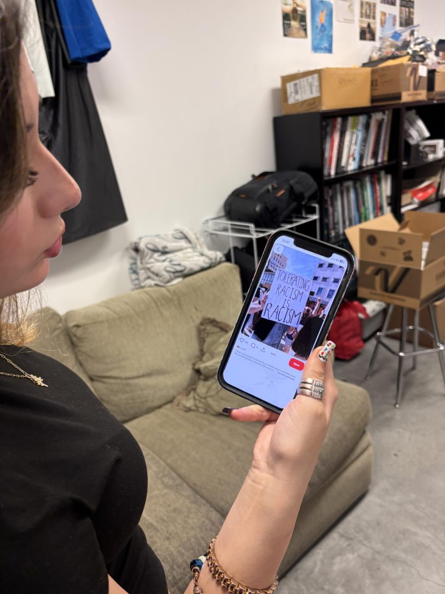 Kylie Goodnick (10) scrolls through social media posts. 