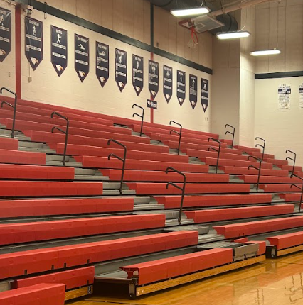 During lunch, students can sit in the bleachers but cannot have food in the gym. 