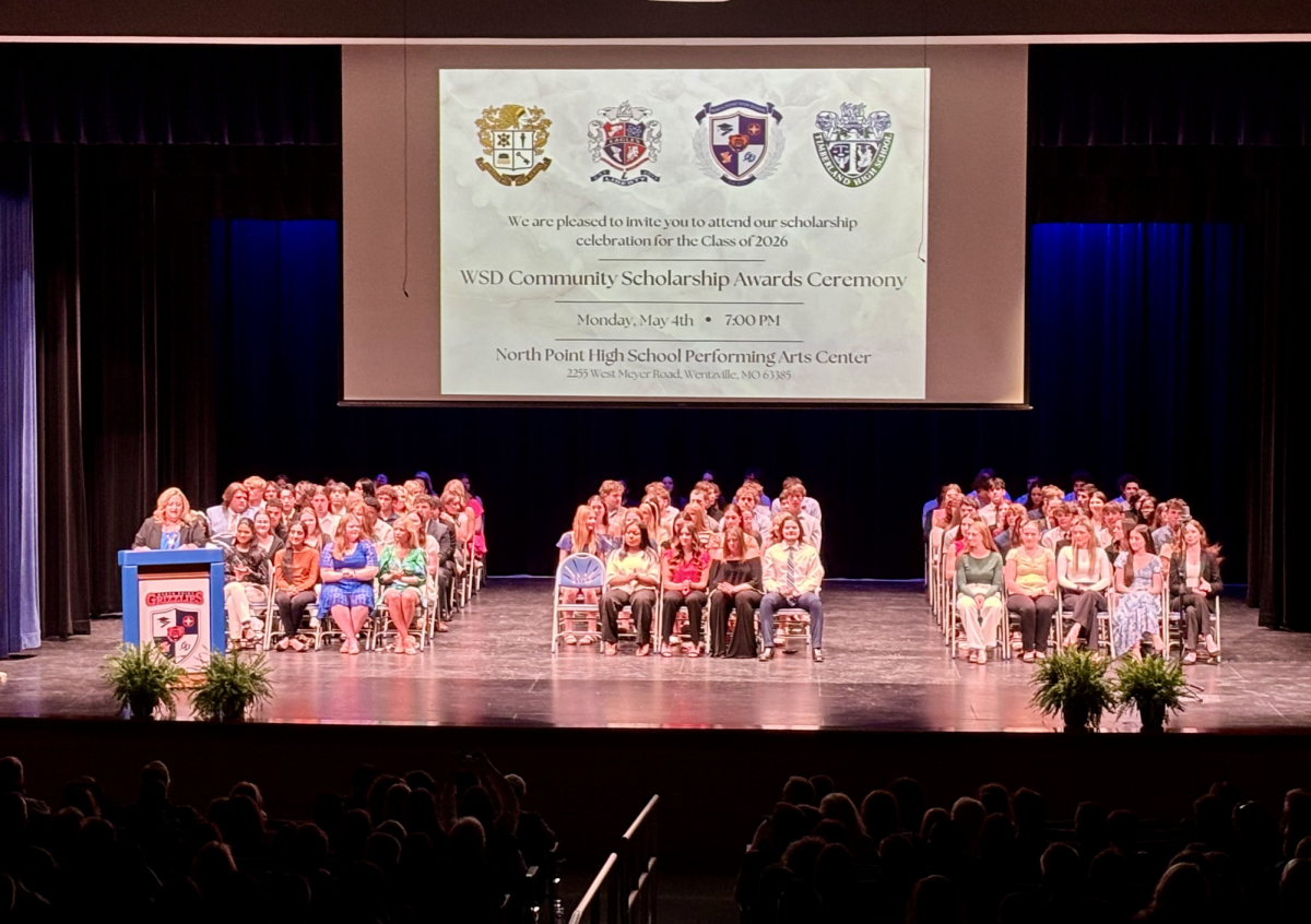 A select number of the Wentzville senior class sits on stage, waiting to hear their name. Each student was personally invited to the event after being selected as a recipient by an array of local sponsors.