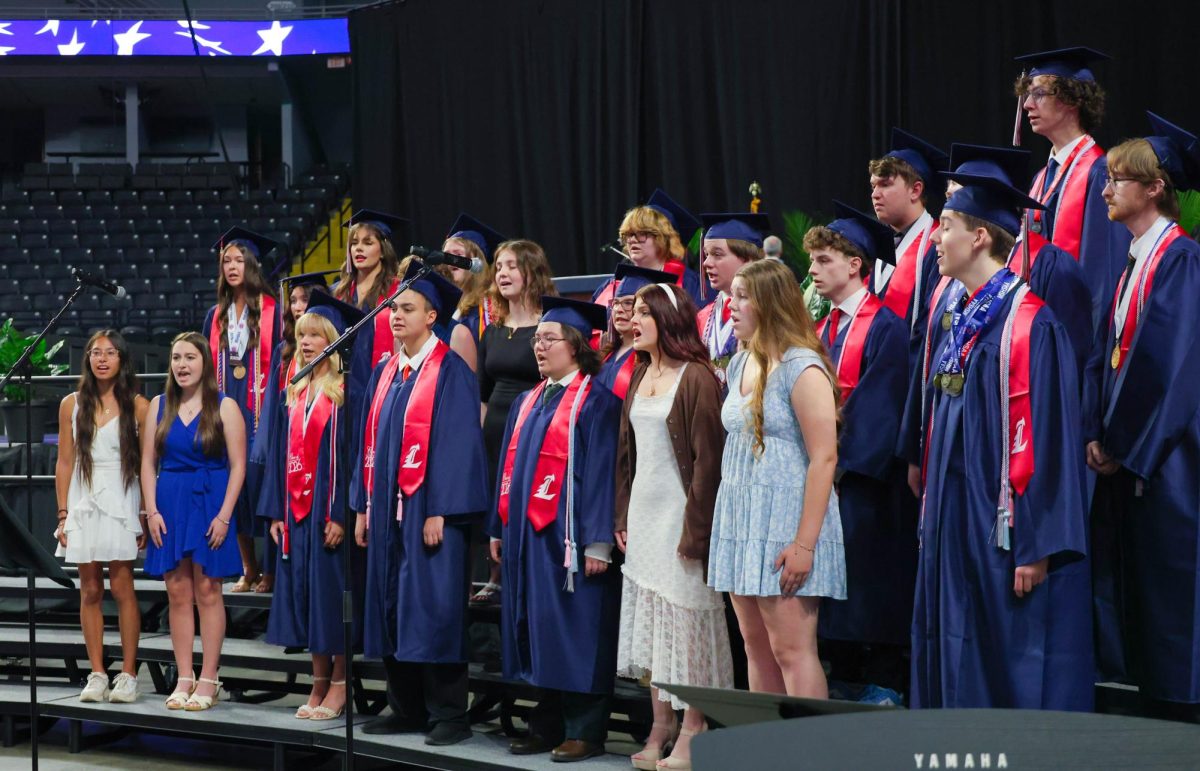 Chamber Choir performs the National Anthem at the beginning of the Commencement.