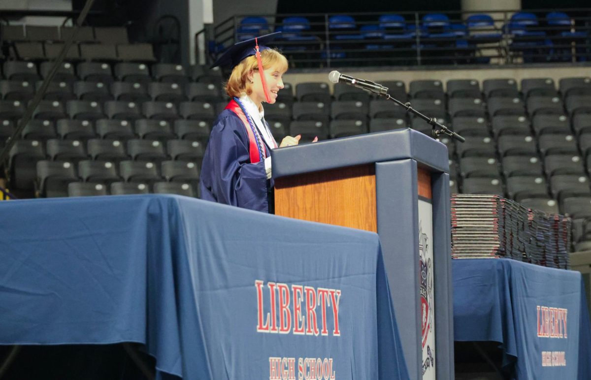 Leah Dudley shares a story at the beginning of her speech.