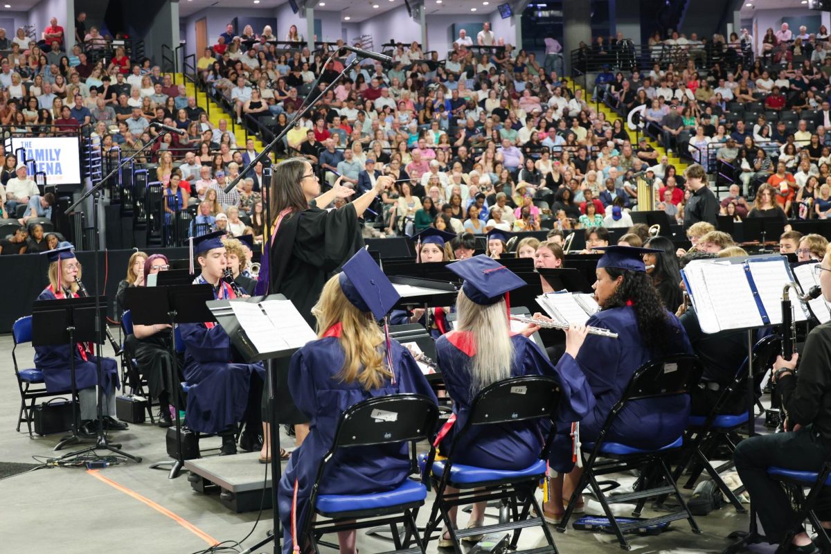 Mrs. Sarita Magno-Parsons leads Liberty's concert band in performing "Eagles Among Us."